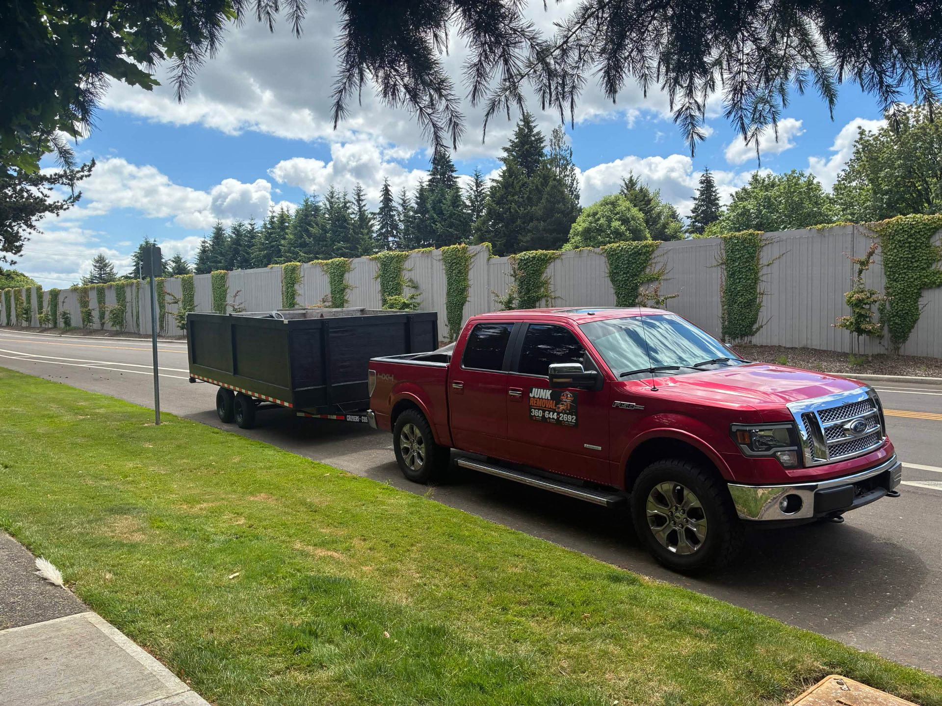 Haul Away Junk Removal truck and trailer ready for pickup